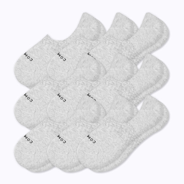 Nine pairs of no-show socks in a light heather gray color, arranged in a fan-like pattern on a plain white background.