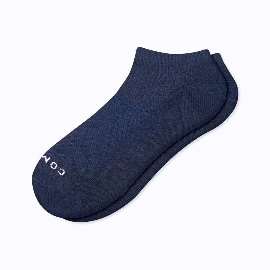 A pair of nylon ankle compression socks in navy solid