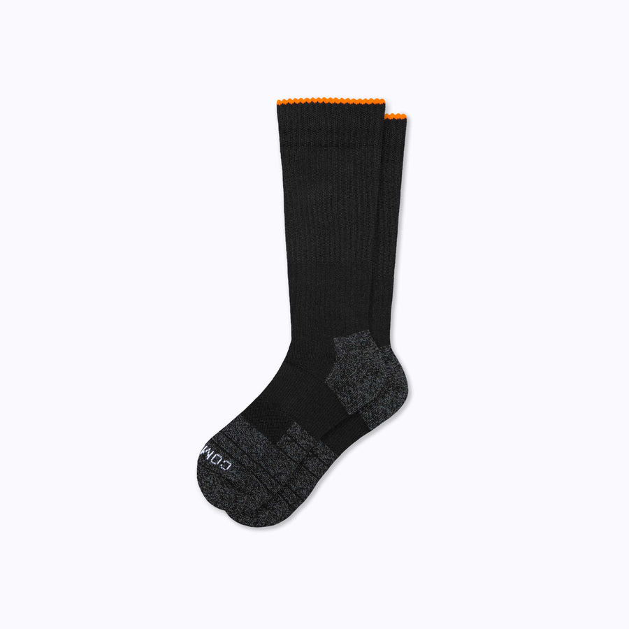 a pair of knee-high compression socks in black from Comrad Socks
