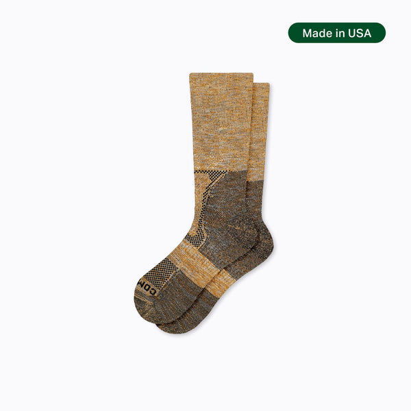 Pair of brown and gray socks on a white background with 'Made in USA' label.