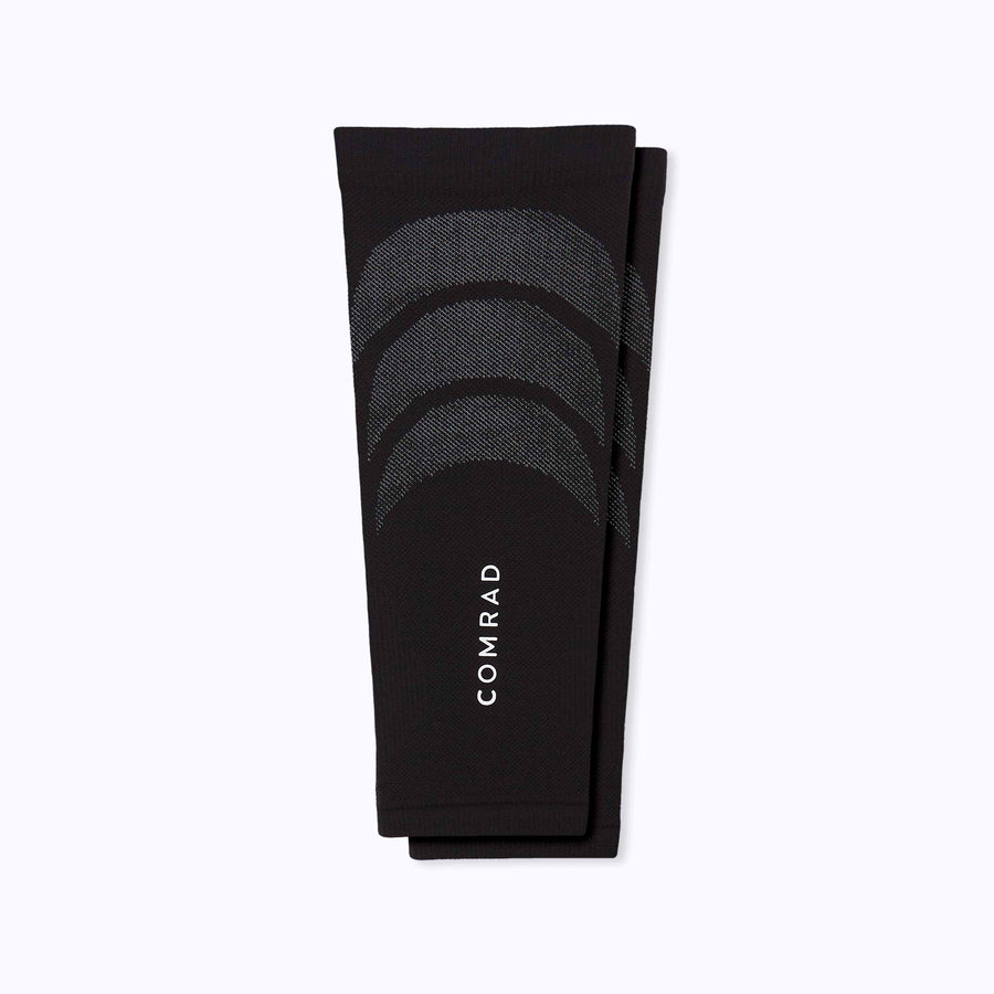 A pair of calf compression sleeve performance blend black solid