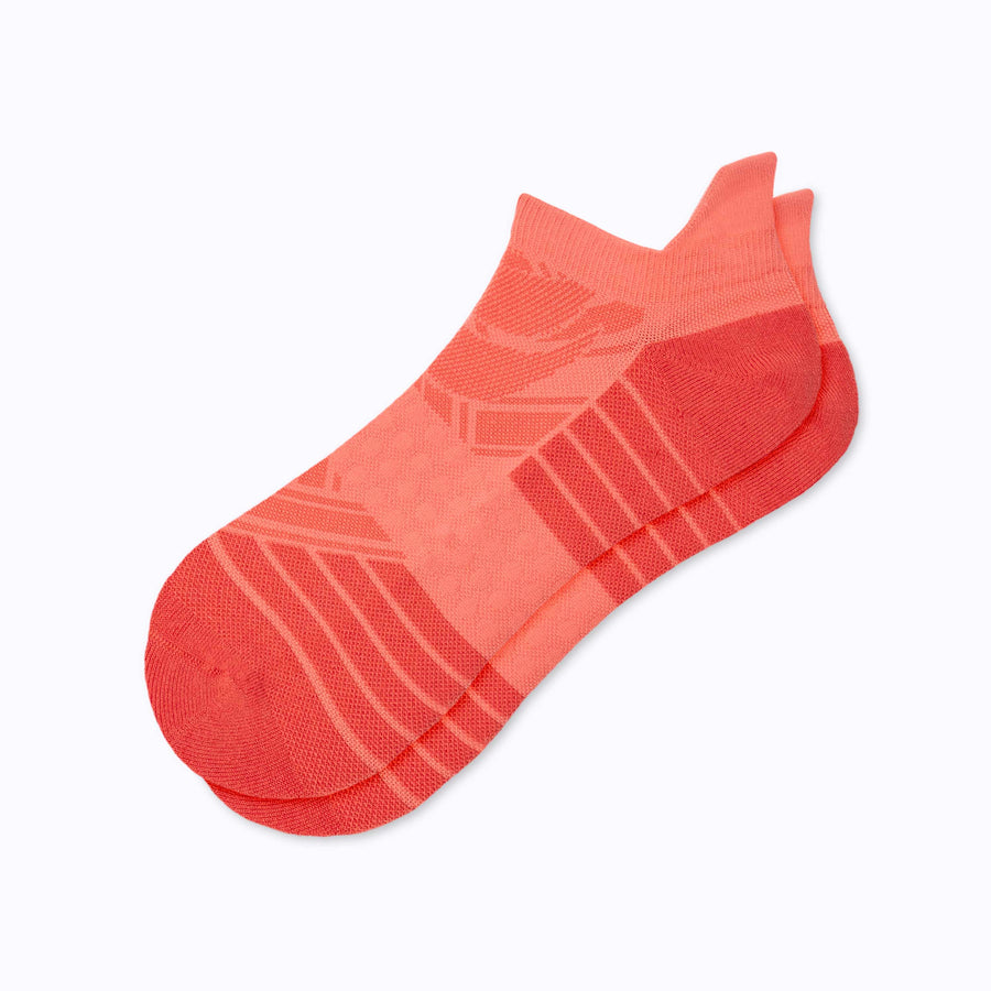 A pair of an athletic tab ankle socks coral solid
