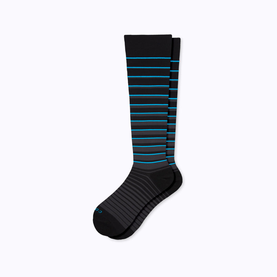 a pair of striped knee-high compression socks from Comrad Socks