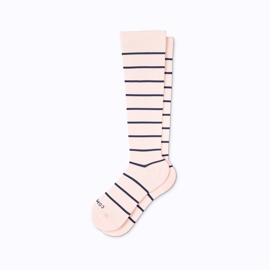 A pair of nylon knee high socks in rose-navy stripes