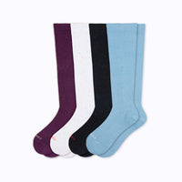 4 pack of recycled cotton knee-high socks in potent, white, black, light blue