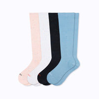 4 pack of recycled cotton knee high socks in rose, white, black and light blue