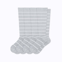 Set of four gray socks with white stripes on a white background