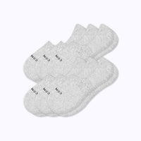 six pairs of low-cut ankle socks in a light heather gray color, arranged in a fan shape on a plain white background.