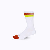 Side view of cotton crew socks in white-cinnamon stripes