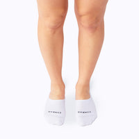 Front view  of feet wearing the combed cotton loafer liners in white solid