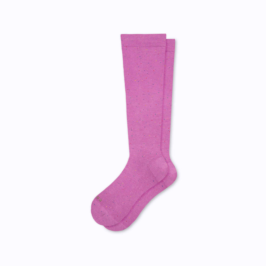 A pair of recycled cotton knee-high compression sock in mulberry