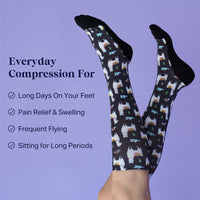Compression socks with a pattern of dogs and text on a purple background