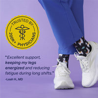 Person wearing white sneakers and patterned socks with a purple background, featuring a 'Trusted by 200k+ Physicians' badge.