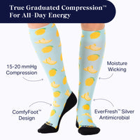 Knee-high socks with lemon pattern and text highlighting features on a white background