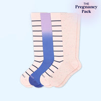 Four pairs of knee-high socks on a light blue background, labeled 'The Pregnancy Pack'.