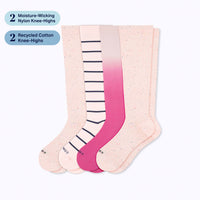Set of two knee-high socks with gradient design on a white background