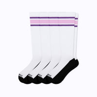 Four white crew socks with black toes and heels, featuring two horizontal stripes near the top in purple and light pink, arranged in a fan shape on a white background.