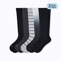 Set of five pairs of knee-high socks in black, gray, and white on a white background.