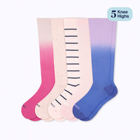 Set of five knee-high socks in pink, beige, and blue with gradient effects on a white background.