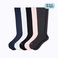 Set of five pairs of knee-high socks in navy, white, black, pink, and gray on a white background.