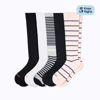 Set of five pairs of knee-high socks in black, white, gray, and pink with striped pattern on a white background.