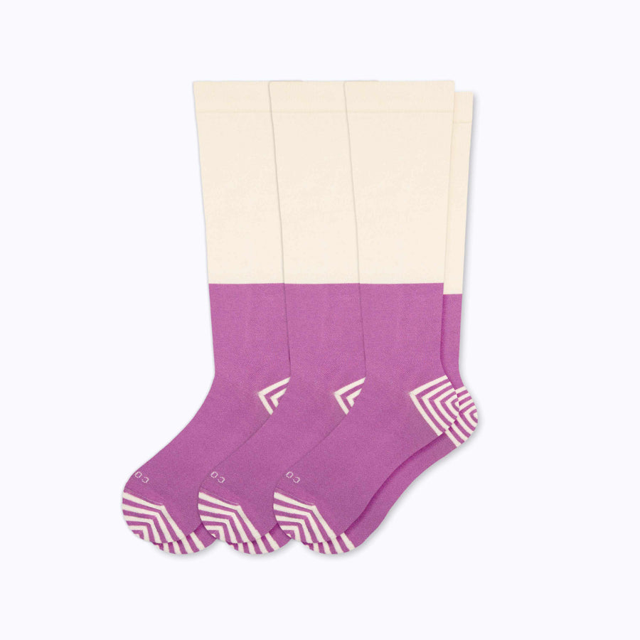 A 3-pack of cotton compression socks in crem-mulberry tencel colorblock