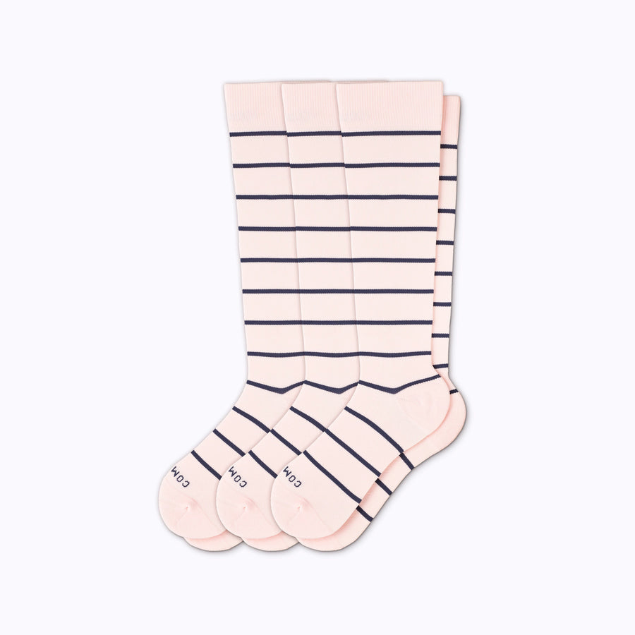 A 3-pack nylon knee high compression socks in rose-navy stripes