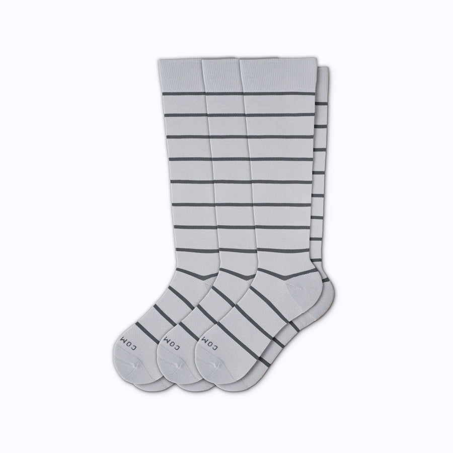 A 3-pack nylon knee high compression socks in grey-charcoal stripes