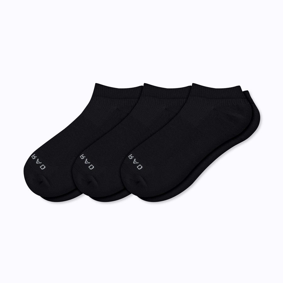 A 3 pack of ankle socks in black solid