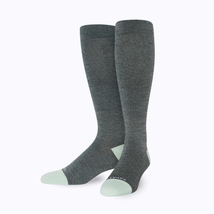 Front view of knee high compression socks in black-blue-sage