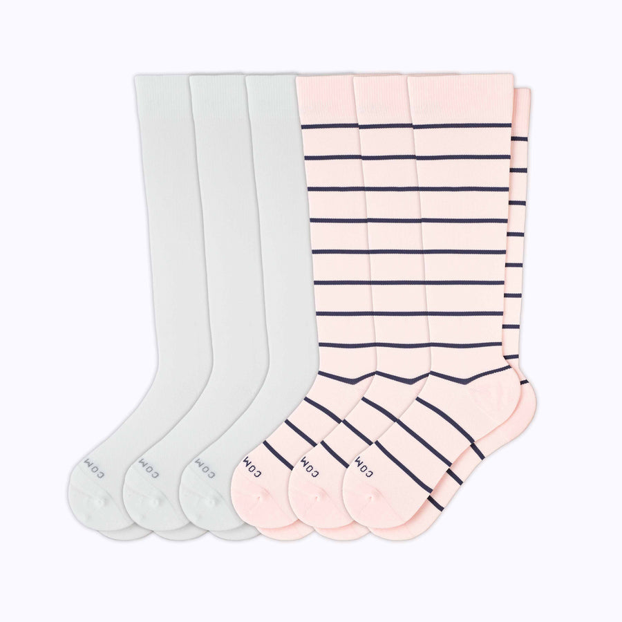 A 6-pack of solid compression socks in rose-navy-white stripes