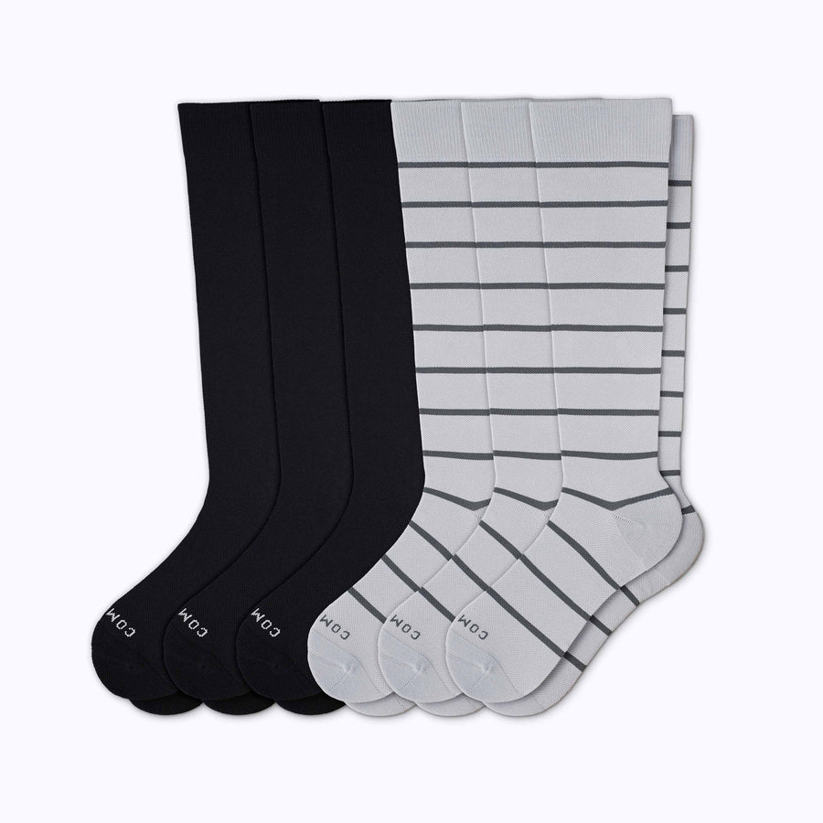A 6-pack of solid compression socks in black-grey-charcoal stripes