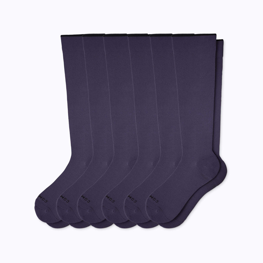 A 6-pack nylon knee high compression socks in navy solid