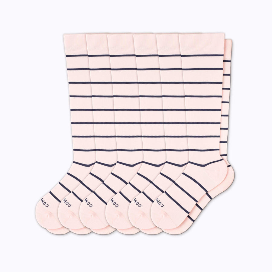 A 6-pack nylon knee high compression socks in rose-navy stripes