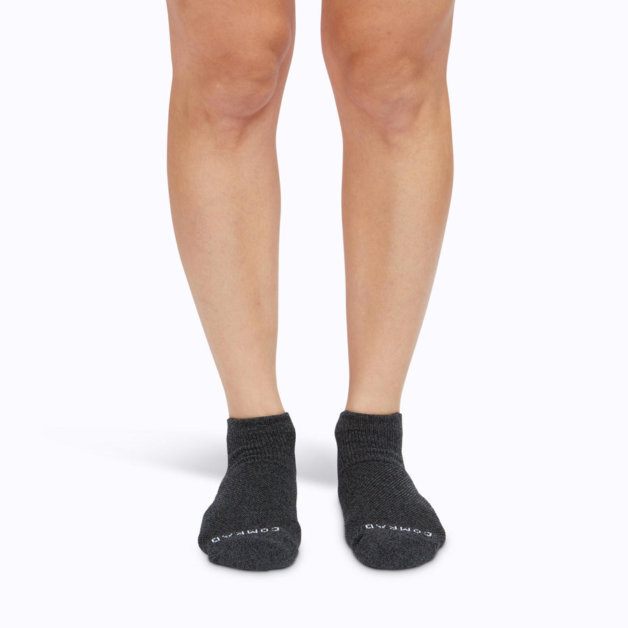 Front view of feet wearing nylon ankle compression socks in heather-charcoal solid