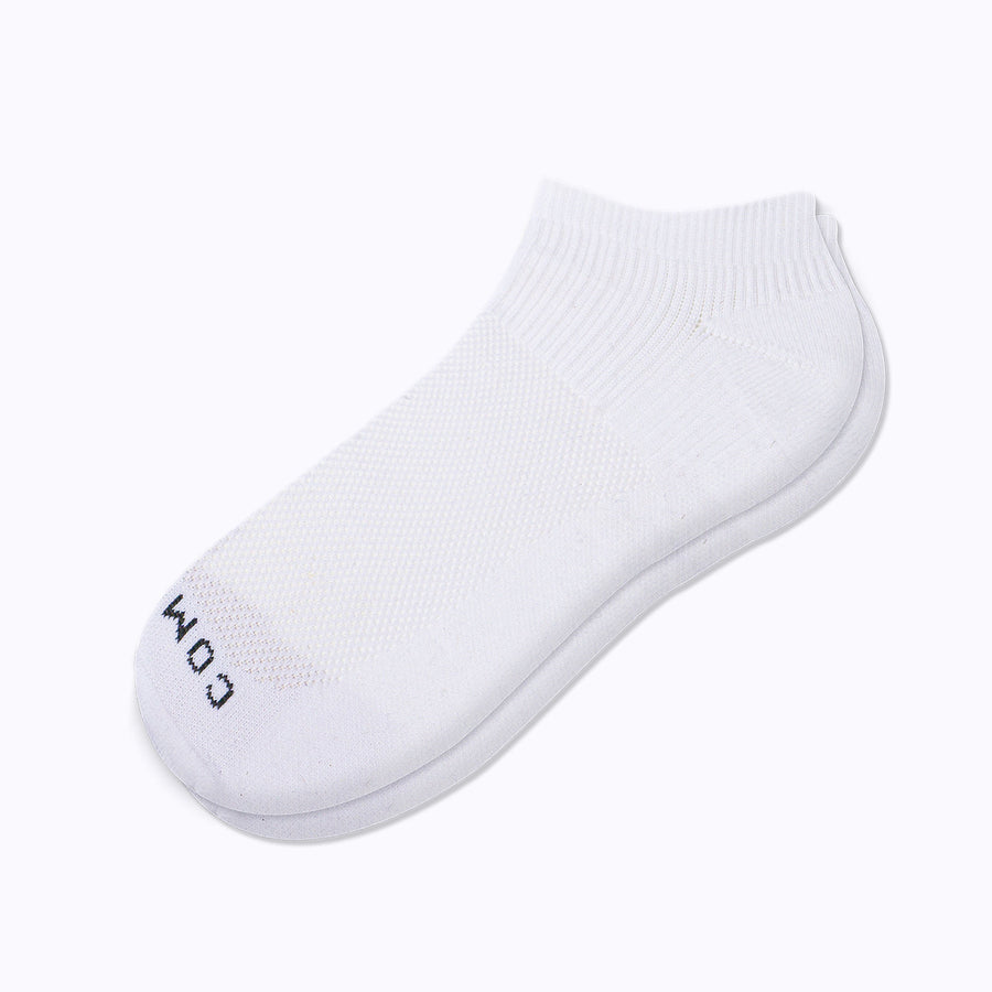A pair of nylon ankle compression socks in white solid