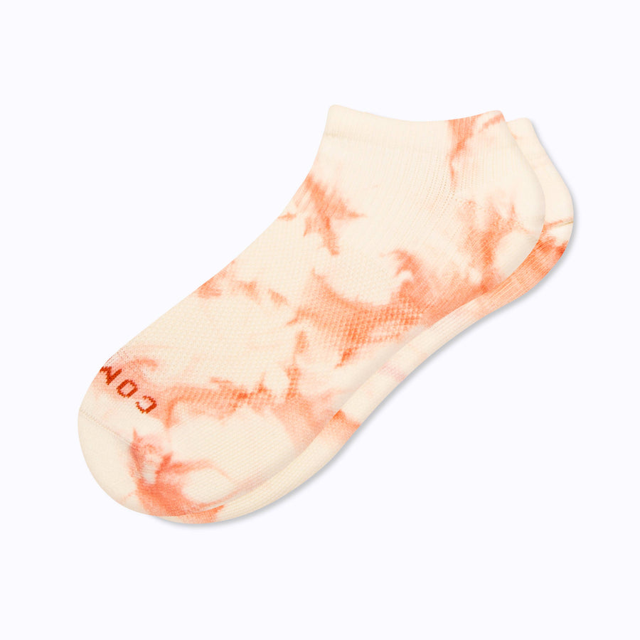 A pair of nylon ankle soks in terra-cotta tie-dye