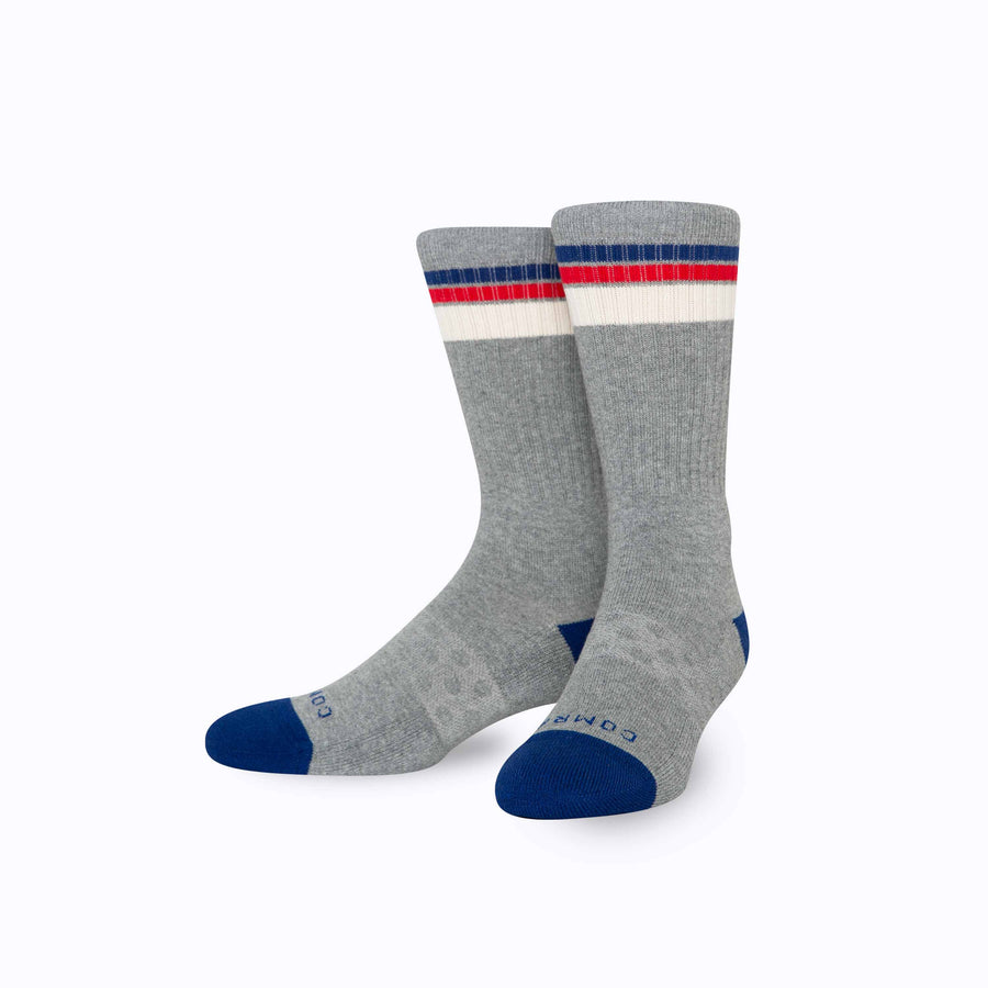 Front view of cotton crew socks in grey-navy stripes