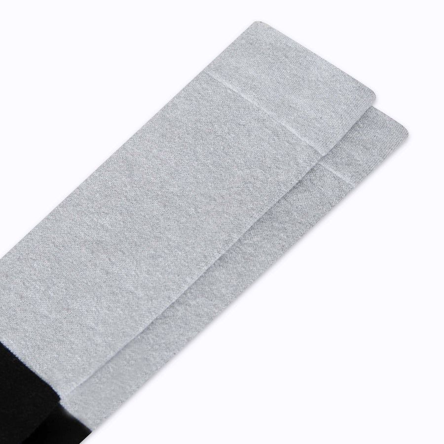 Close up view of cotton compression socks in grey-black tencel colorblock