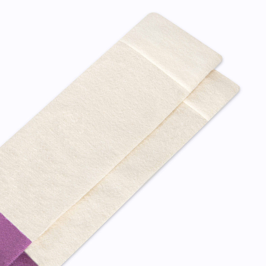 Close up view of cotton compression socks in crem-mulberry tencel colorblock