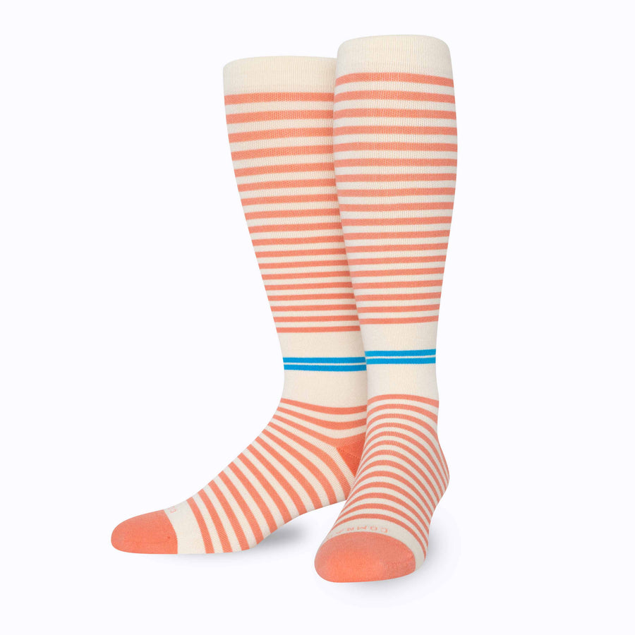 Front view of cotton compression socks in cream-terra-cotta tencel stripe